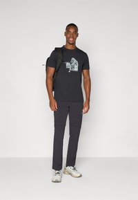 Mammut RUNBOLD ZIP OFF PANTS MEN - Hlače za na prostem - black