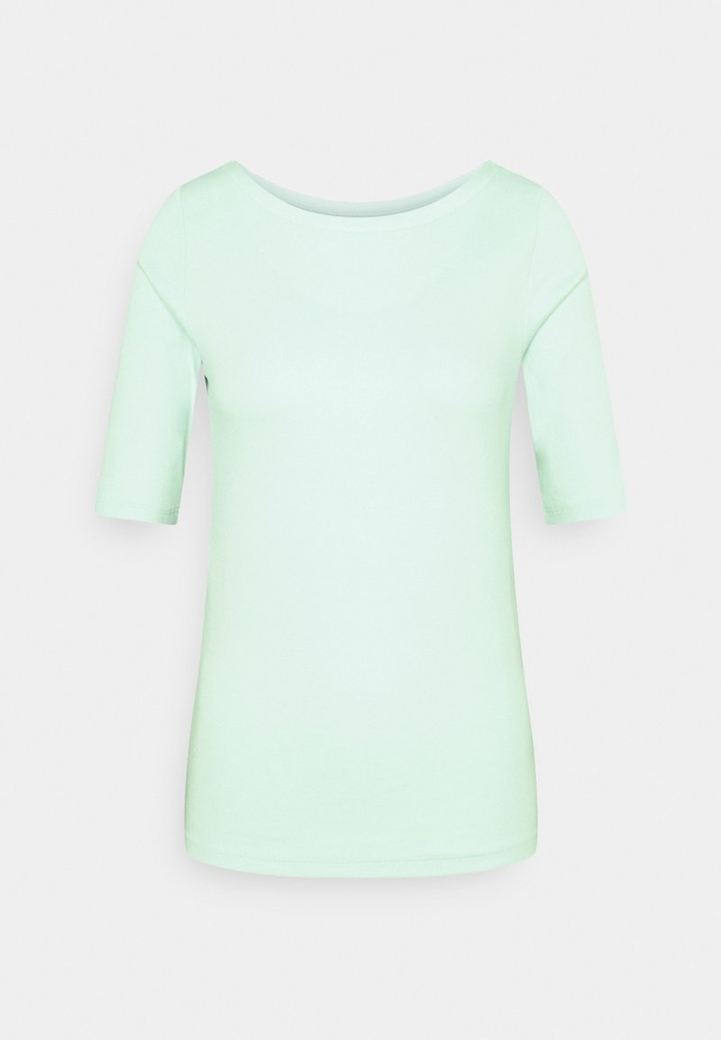 Chemise vert clair à manches courtes avec un col rond, présentée sur un fond uni gris clair.