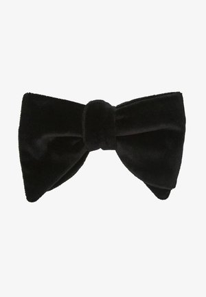 Papillon in velluto nero con nodo al centro, ampi anelli simmetrici e una morbida texture peluche.
