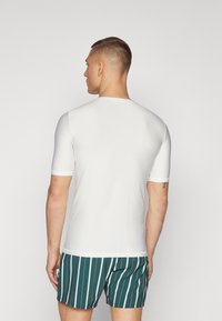 O'Neill ESSENTIALS CALI SKINS - Maglia da surf - snow white