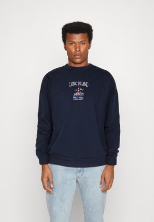 Navy blue sweatshirt in cotton-blend, featuring a round neckline, long sleeves, and embroidered "LONG ISLAND" and lighthouse design on the front.