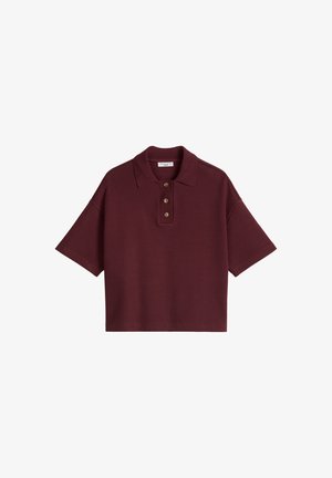 Polo a maniche corte color marrone scuro con tre bottoni marroni e un colletto, mostrato su uno sfondo bianco.