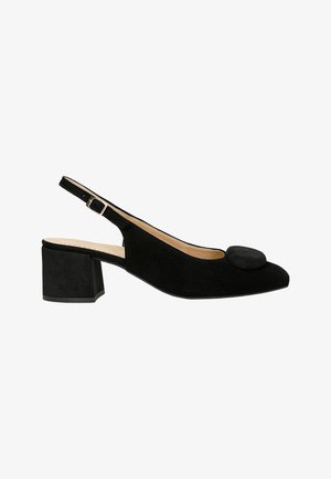 Chaussure slingback en suède noir avec un accent rond, petit talon bloc, bout pointu et bride cheville ajustable. Texture lisse partout.