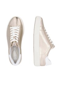 Metallic gold sneakers with white laces, padded white heel, and textured surface. Lightweight design, minimalistic style, flat white sole.
