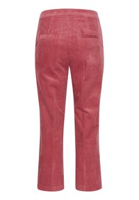 Pantalon en velours côtelé rouge avec coupe droite et deux poches arrière horizontales vues de dos.