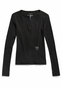 Schwarzes Langarmoberteil aus geripptem Stoff mit Henley-Ausschnitt, teilweiser Knopfleiste und einem kleinen grafischen Etikett auf der Vorderseite.