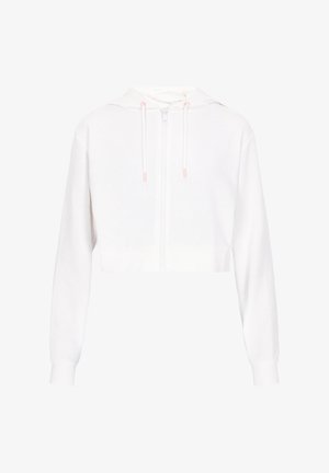 Sudadera blanca recortada con mangas largas, un zipper frontal y cordones con acentos en rosa. Hecha de una tela suave con una textura lisa.