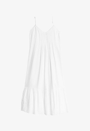 Vit ärmlös klänning i lätt tyg, med en plisserad byst och en vänster, volangkant nederkant. Slät textur genom hela klänningen.