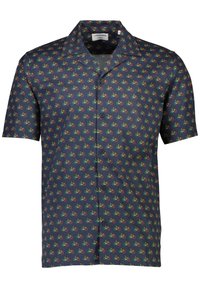 Korte mouwen overhemd van marineblauwe stof met een patroon van veelkleurige fietsen. Knopsluiting aan de voorkant en klassieke kraag. Zachte textuur.