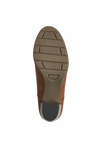 Brown suede shoe with a flexible rubber sole, featuring a textured grip pattern, engraved size '37', and a rounded toe design.