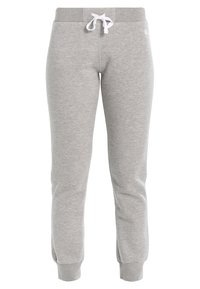 Graue Jogginghose aus weichem Material, mit einem elastischen Bund und weißem Kordelzug, gerippten Bündchen und einem Logo auf der linken Hüfte.