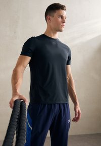ICANIWILL MIRAGE MEN - T-skjorte til trening - black