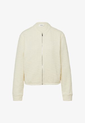 Roomkleurig getextureerd jasje met lange mouwen, geribbelde kraag en zilverkleurige rits aan de voorkant, zonder zichtbare zakken.