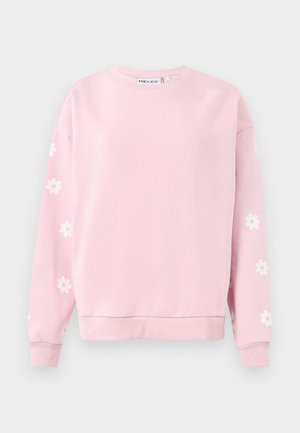 Lyserosa sweatshirt med rund hals, lange ermer, og hvite tusenfryd mønstre på ermene. Laget av myk bomullsblanding.