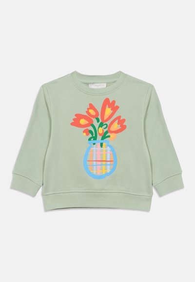 Φόρμα παιδική ανοιχτό πράσινη με πολύχρωμο γραφικό με πορτοκαλί τουλίπες σε ριγέ μπλε βάζο μπροστά.