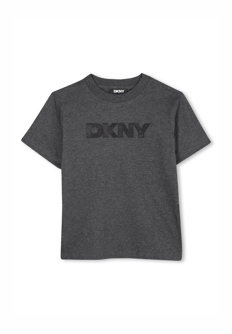 T-shirt en coton gris à manches courtes, avec un logo DKNY en relief noir à l'avant. Encolure ras du cou, coupe classique et texture lisse.