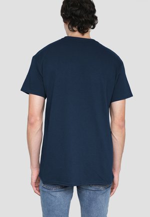 Navy blue cotton t-shirt with a classic crew neckline and short sleeves, shown from the back. Soft texture and relaxed fit.