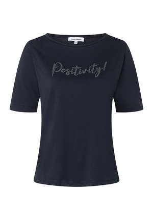 T-shirt à manches courtes bleu marine en coton doux, avec une coupe décontractée et une inscription en strass argentés disant "Positivité !" sur la poitrine.
