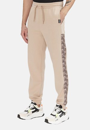 Pantaloni sportivi - marrone chiaro