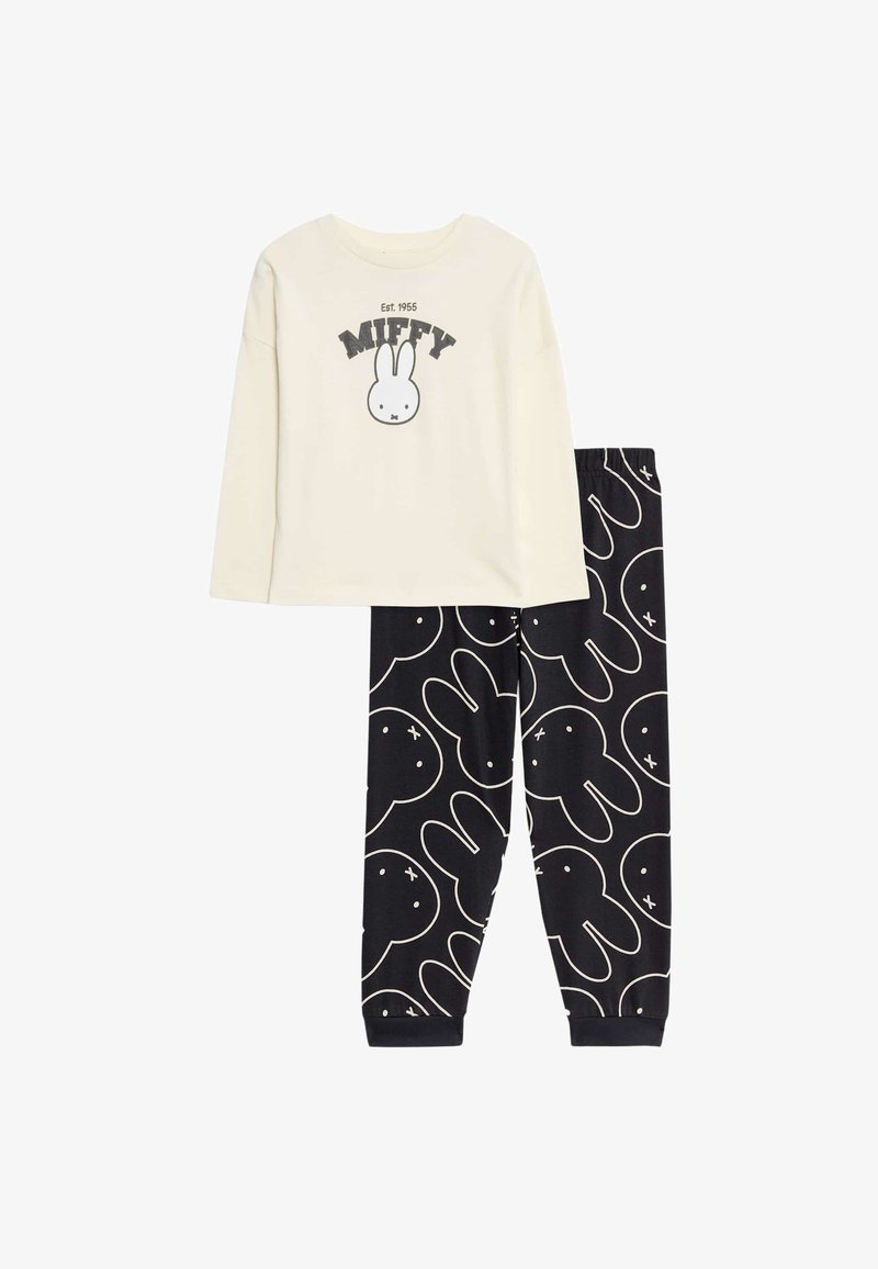 Two-piece pajama set featuring a cream long-sleeve top with a Miffy graphic and black pants with a white bunny pattern. Soft cotton fabric.