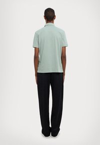 Armani Exchange Polo krekls - green milieu