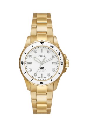 Goldfarbene Fossil-Armbanduhr mit weißem Zifferblatt, Kristall-Stundenmarkierungen, drehbarer Lünette und bis 100 Meter wasserbeständig.