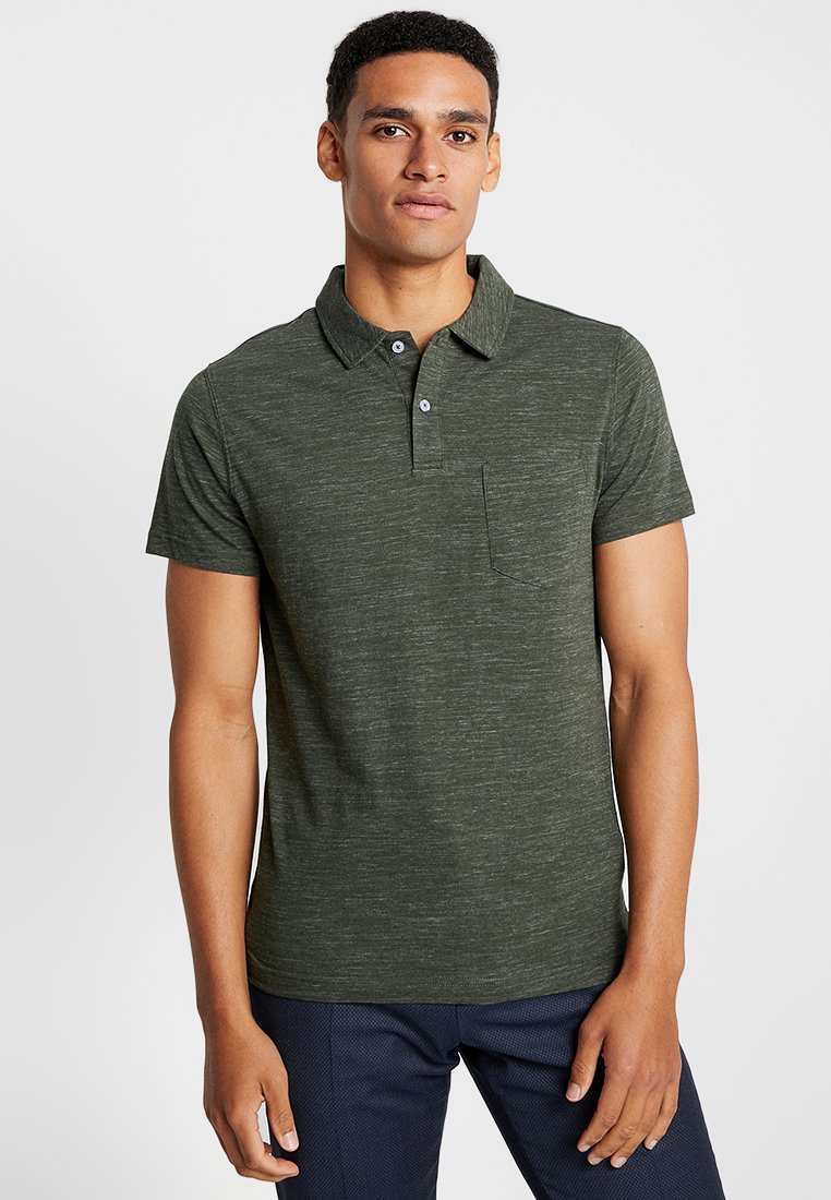 Dark green polo shirt featuring a textured fabric, buttoned collar, and a chest pocket. Short sleeves and a slim fit design.