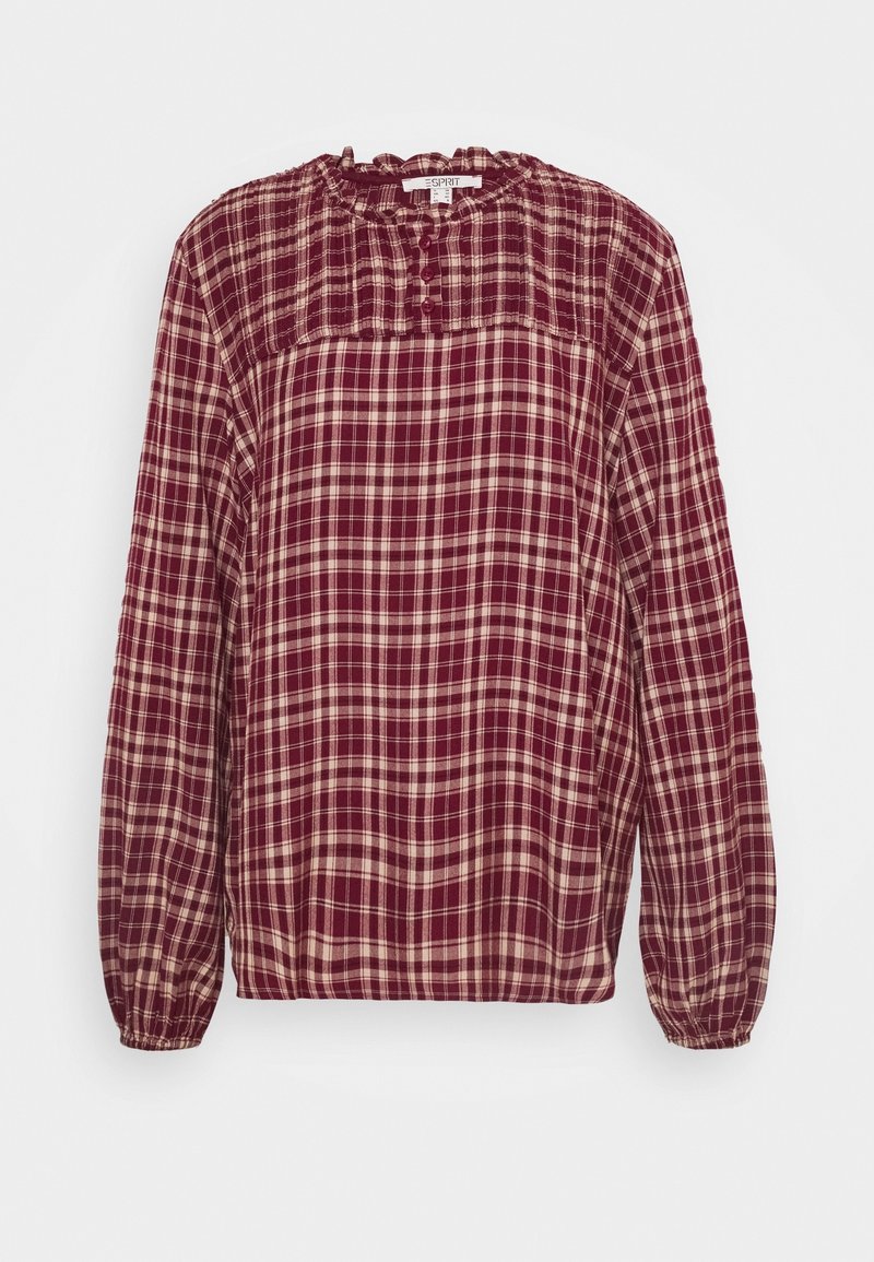 Blouse bordeaux à manches longues avec un motif à carreaux crème. Dotée d'un col smocké et d'une patte de boutonnage à l'avant. Tissu à la texture douce.