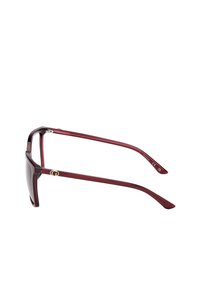 Obdélníkové burgundské sluneční brýle s lesklým povrchem. Mají tenké nožičky a malou zlatou ozdobu na spánku. Tmavá skla.
