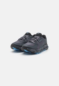 Gray athletic shoes with mesh and synthetic upper, textured blue accents, and a rugged sole. Features traditional lacing and cushioning.