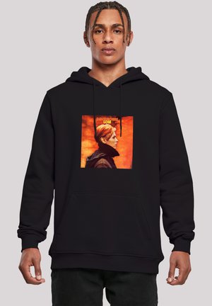 Black hoodie featuring a central graphic with a profile of a person against an orange background, with the text "DAVID BOWIE LOW" above.