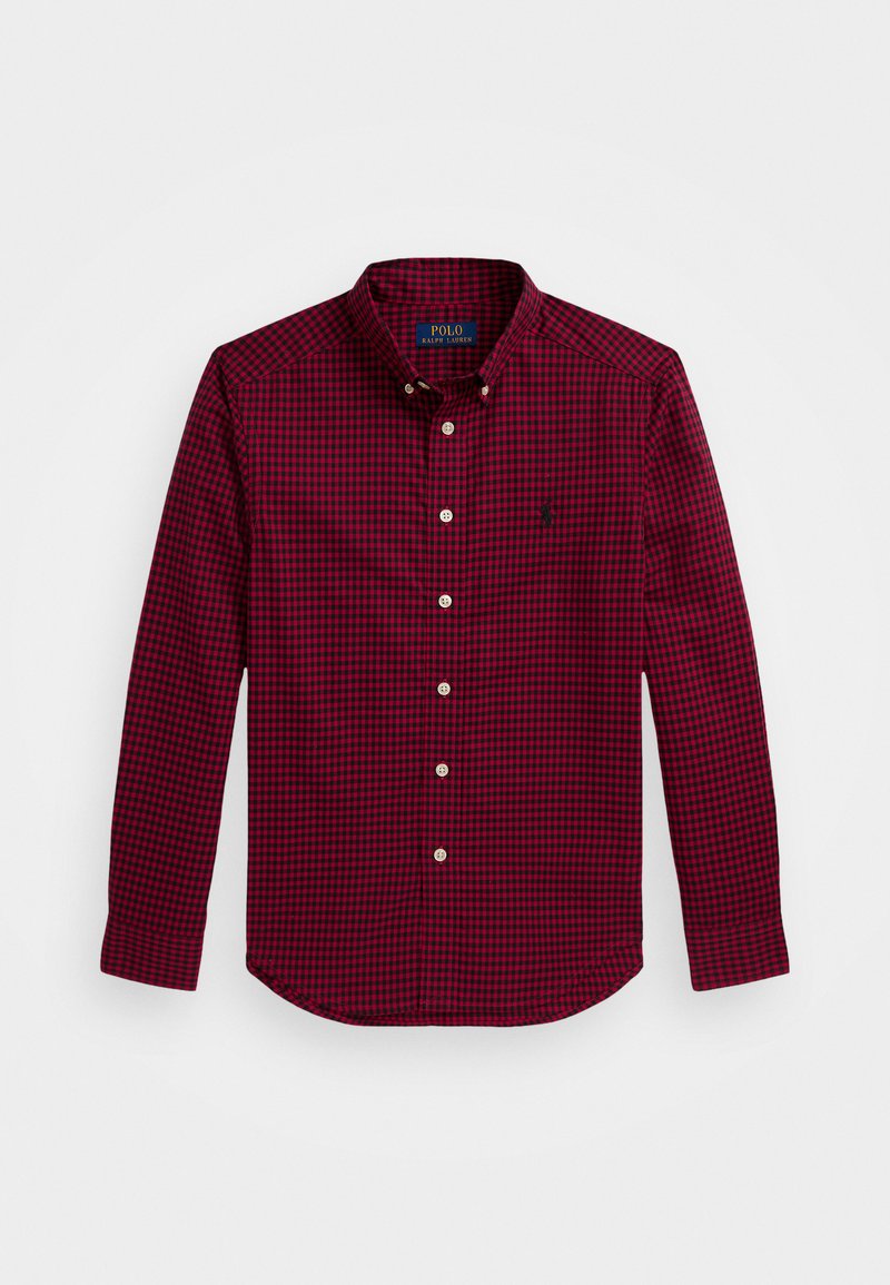 Rød og marineblå rutete skjorte med lange ermer, kragehals og en liten brodert logo på venstre bryst.