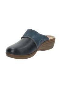 Zoccolo slip-on nero e blu navy con suola curva marrone e soletta imbottita color tan, progettato per comfort e uso casual.