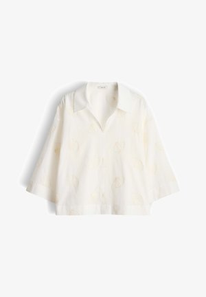 Witte blouse met driekwart mouwen, kraag, subtiele geborduurde schelpenpatronen en een losse, boxy pasvorm.
