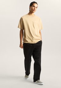 Vans MN RANGE RELAXED ELASTIC Pantaloni black/nero - Main Image