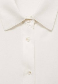 Mango Blúzka so zapínaním na gombíky - off-white