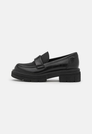 Marco Tozzi BY GUIDO MARIA KRETSCHMER - Pantofi slip-on - black brush