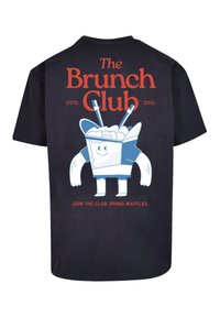 Black t-shirt featuring a blue cartoon character resembling a takeout box, with "The Brunch Club" in red text and “JOIN THE CLUB. BRING WAFFLES.”