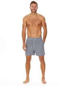 Gestreifte Badehose in Marineblau und Weiß, mit einem elastischen Bund und Kordelzug. Leichter Stoff, knielanger Schnitt, ohne Taschen.