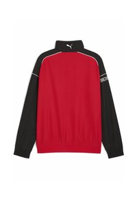 Giacca rossa e nera con colletto alto, polsini elasticizzati e piping bianco lungo le cuciture. Logo Puma stampato sulla manica sinistra.