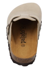 Beige leather clogs with a rounded toe, adjustable strap and a cork footbed; features a textured rubber outsole. Brand name visible inside.
