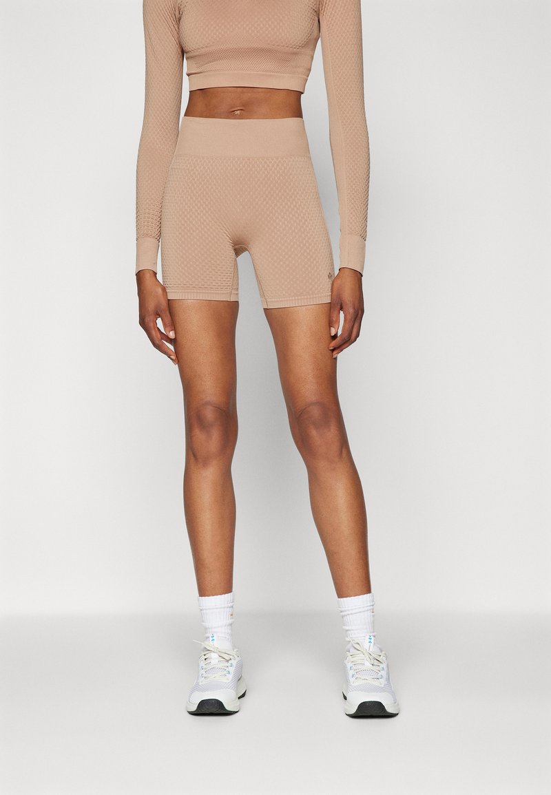 Even&Odd active MID RISE SEAMLESS CYCLING SHORTS WITH RIBBED WAISTBAND
- Tights - dark brown
