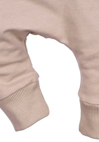 Beige Baumwoll-Sweatshirt mit gerippten Bündchen, lässigem Schnitt und einer tiefen Schrittgestaltung. Weiche Textur mit glatter Oberfläche.