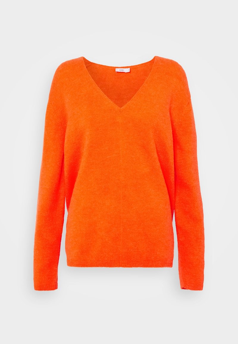 Helle orange Strickjacke mit V-Ausschnitt, langen Ärmeln und lockerer Passform. Weiche Textur mit glatter Oberfläche und geripptem Saum.