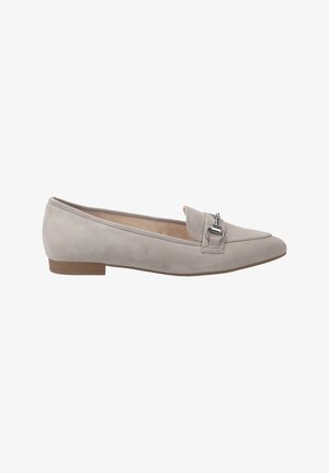 Beige suede flat shoe with a slightly pointed toe, small front flap, and silver hardware detail. Low, brown rubber heel.