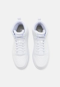White high-top sneakers featuring a smooth synthetic upper, perforated toe box, and textured lace-up design with logo accents on the tongue.