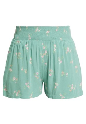 Licht turquoise losse shorts met kleine bloemenprint in roze en wit en een brede elastische gerimpelde tailleband.