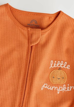 Orange ribbed baby outfit with a front closure, featuring an embroidered pumpkin and the text "little pumpkin." Soft cotton material.