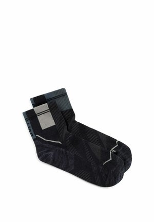 Pair of black and gray ankle socks with geometric patterns and varying shades of gray on a white background.