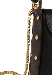Black leather handbag with a textured finish, featuring gold studs and a braided gold chain strap. Magnetic flap closure.